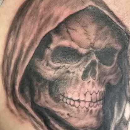 Same hooded skull, close crop