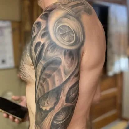 Biomechanical turbine sleeve, full arm view, black and gray